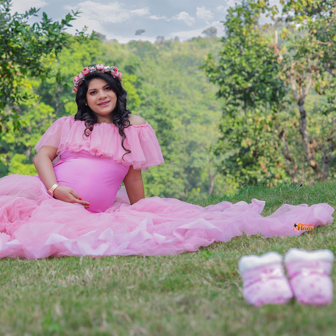 Mother-to-be in a pink gown at an outdoor maternity photoshoot in Ranchi